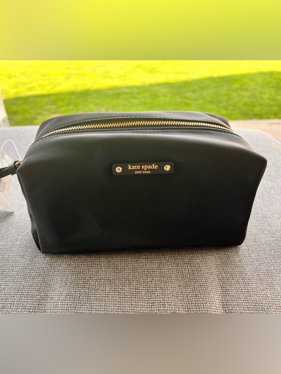 kate spade Handbags - kate spade black toiletry pouch with gold hardware